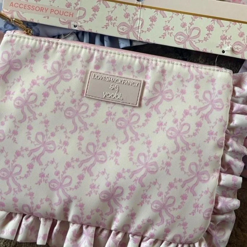 LoveShackFancy & Yoobi floral accessory pouches in pink purple blue & white bows